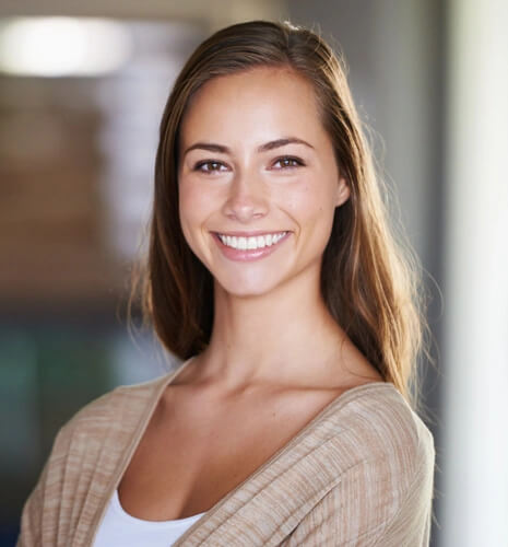 confident woman after having same day dental crowns in Parker