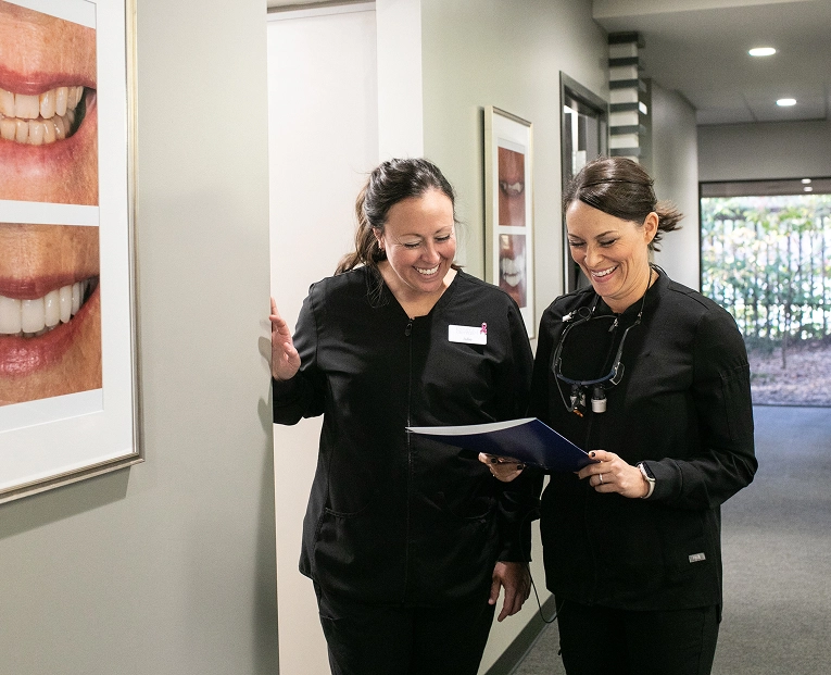 Dentist Pauly and Dental Assistant at Pauly Dental