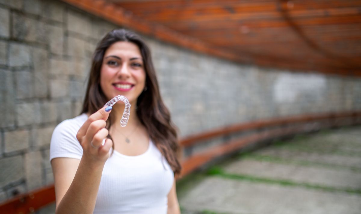 Lady patient with Invisalign for TMJ and jaw pain relief